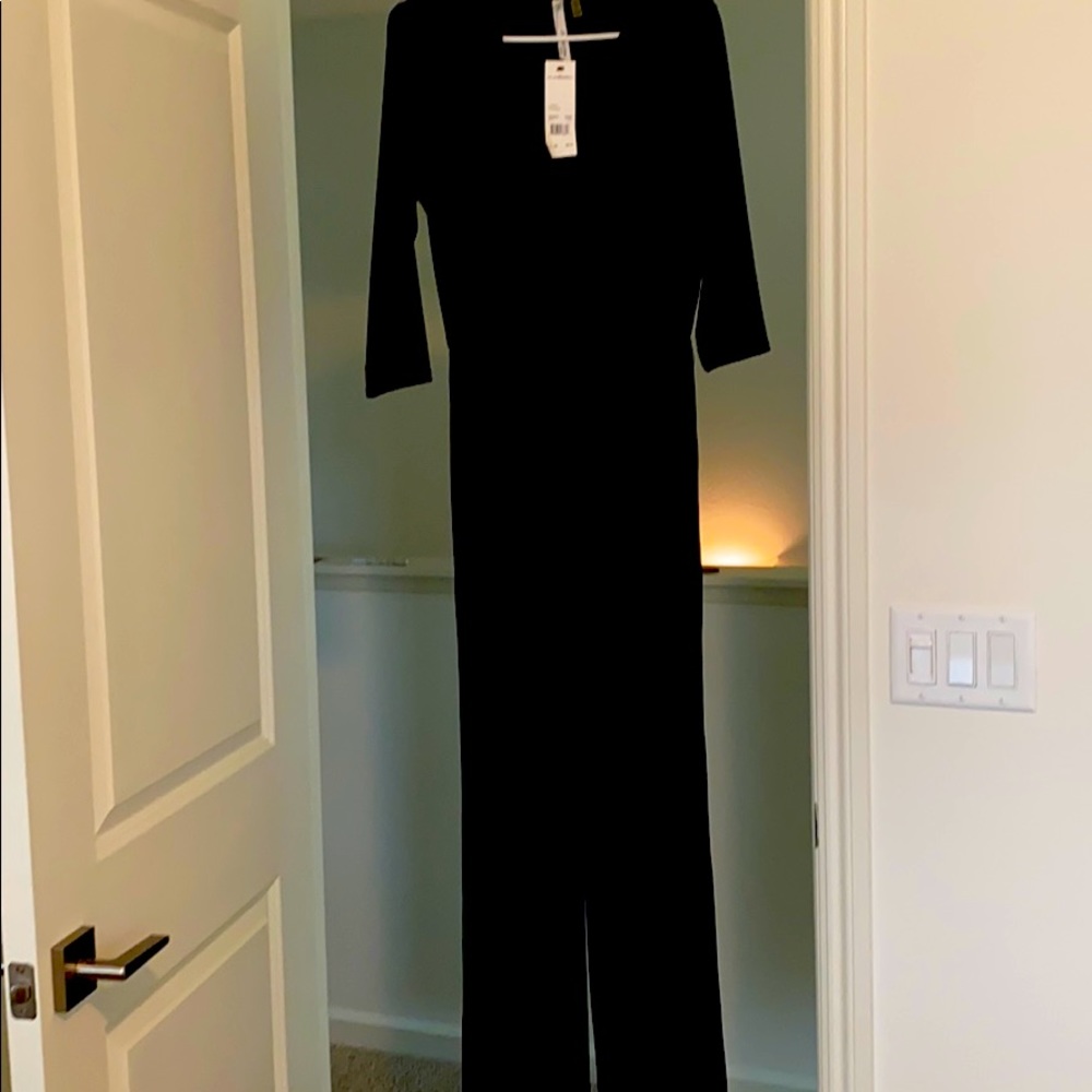 Black long sleeve Petite M jumpsuit.  NBW